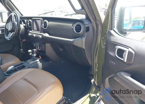 2022 Jeep Wrangler Unlimited Sahara 4X4 z USA, uszkodzony, nr VIN 1C4HJXEN3NW242458